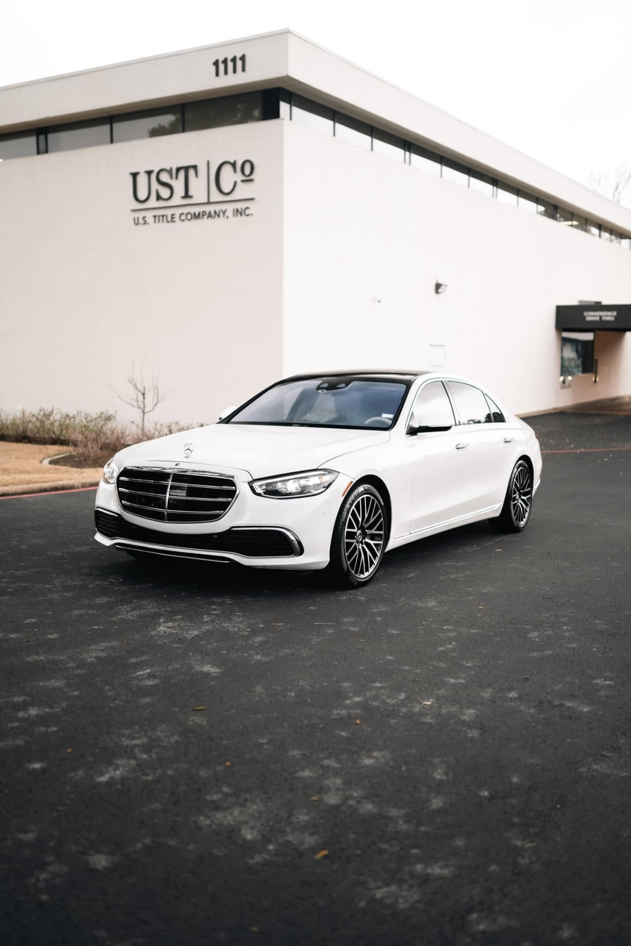 car detailing in Longview by SE Auto Solutions — White Mercedes-Benz S-Class — luxury exterior finish in natural light, Longview