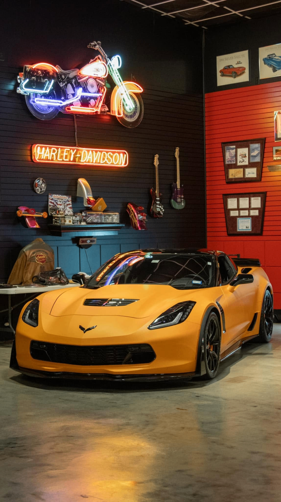 car detailing in Longview by SE Auto Solutions — Yellow Corvette under Harley-Davidson neon — showroom presentation and gloss finish, Longview
