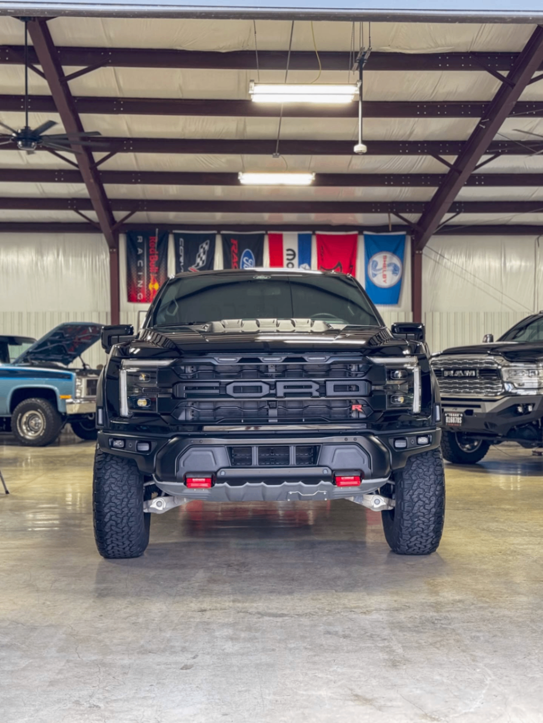 car detailing in Longview by SE Auto Solutions — Black Ford Raptor R — front-end detail inside the SE shop, Longview