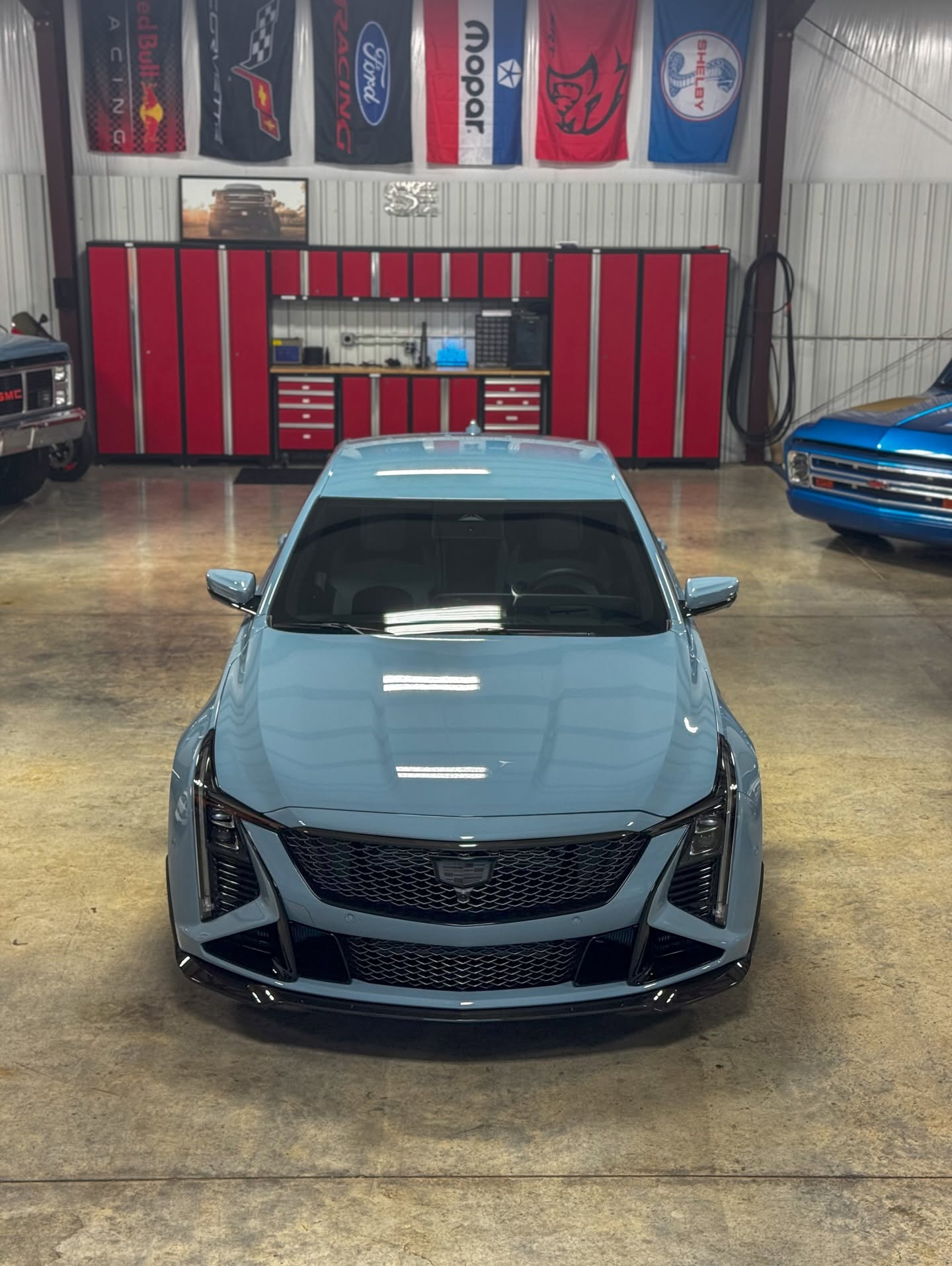 car detailing in Longview by SE Auto Solutions — Cadillac CT5-V Blackwing — gloss finish under shop lights, Longview
