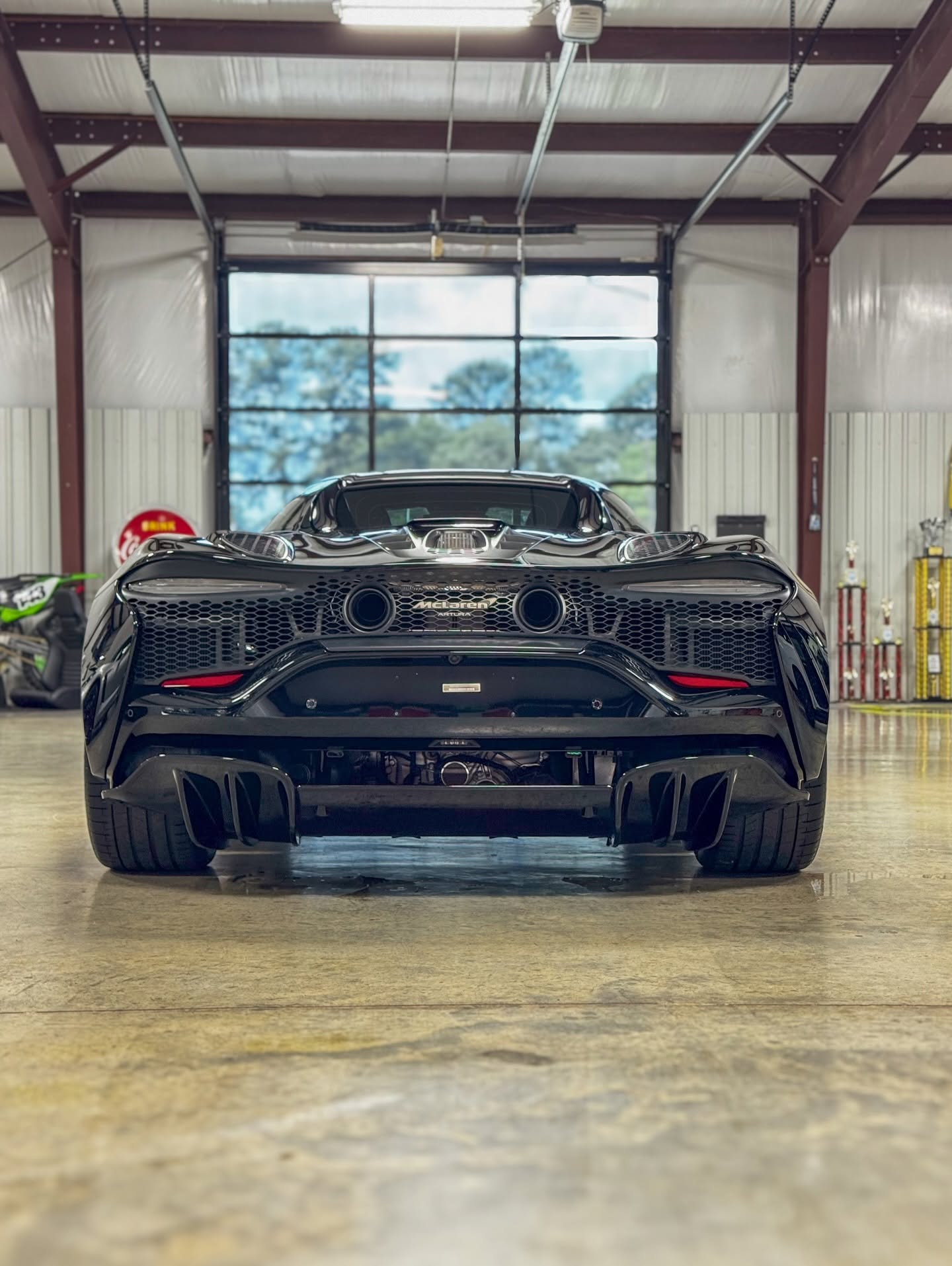 car detailing in Longview by SE Auto Solutions — Black McLaren — rear carbon and exhaust detail presentation, Longview